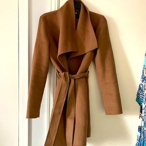 Light weight. Belted. Camel color. No stains.